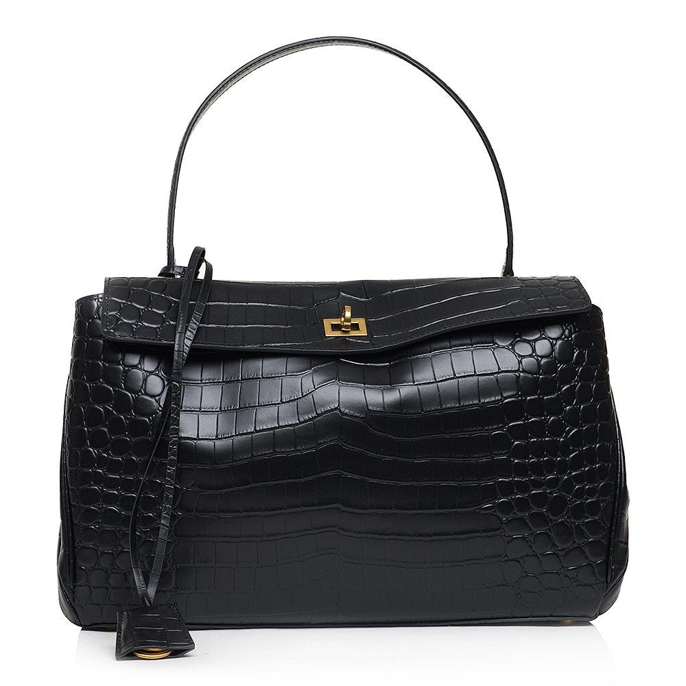 ShoeShop Rodeo black leather handbag with crocodile texture, gold turn-lock closure, and a top handle.