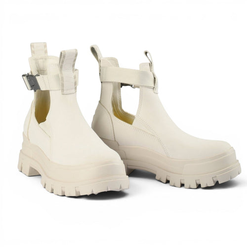 Buffalo cream white leather Chelsea boots with buckle strap detail and chunky lug sole.