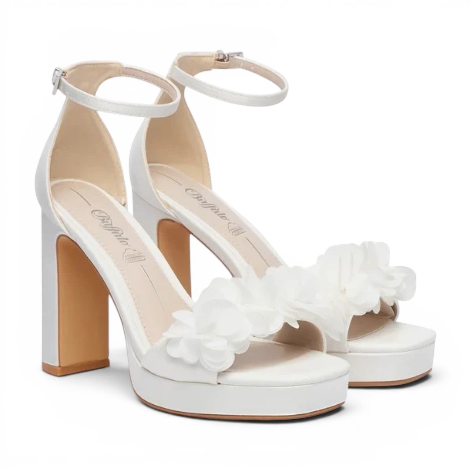 Buffalo white platform block heel sandals with ankle straps and floral embellishments.