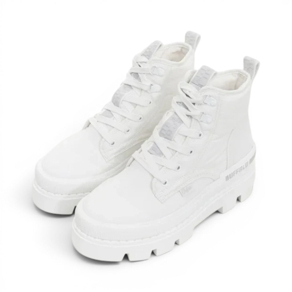 Buffalo Raven Hi white canvas lace-up platform boots with a chunky sole and pull tabs.