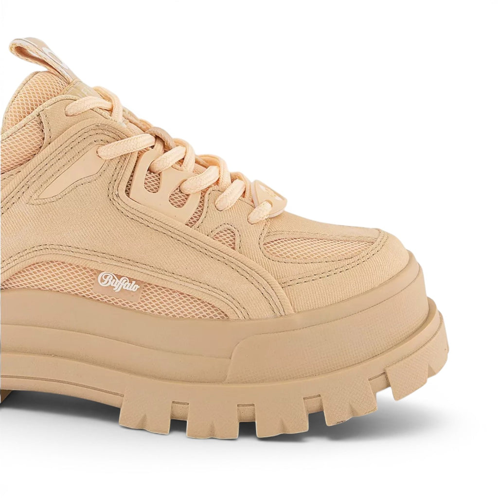 Buffalo Aspha HYB beige canvas and mesh platform sneakers with chunky sole and laces.