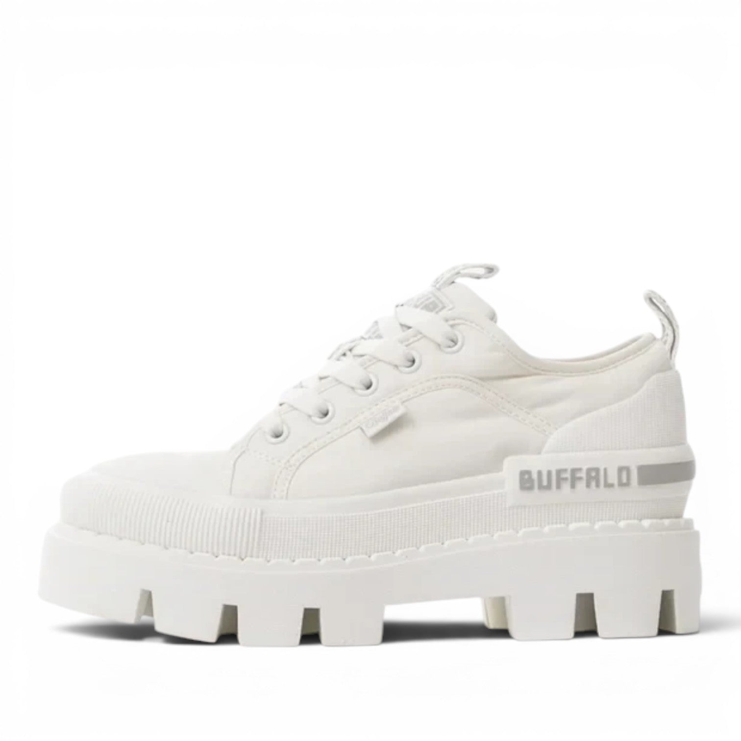 Buffalo white canvas low-top sneakers with a chunky platform sole and lugged outsole. Features a branded heel tab.