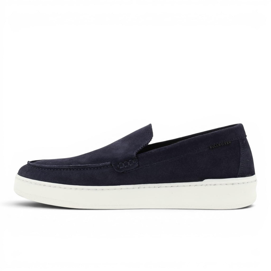 Bullboxer navy blue suede slip-on loafers with white sole and stitched detailing.
