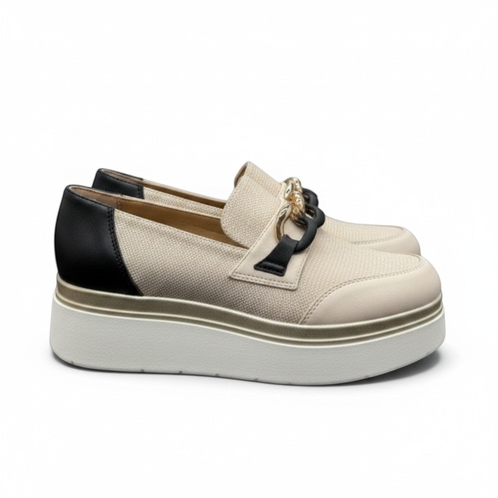 My Store beige canvas and leather loafers with gold chain detail and black heel accent.