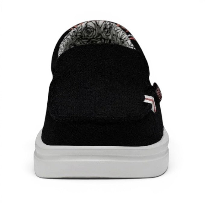 My Store black canvas slip-on moccasins with a rose print lining and a white platform sole.