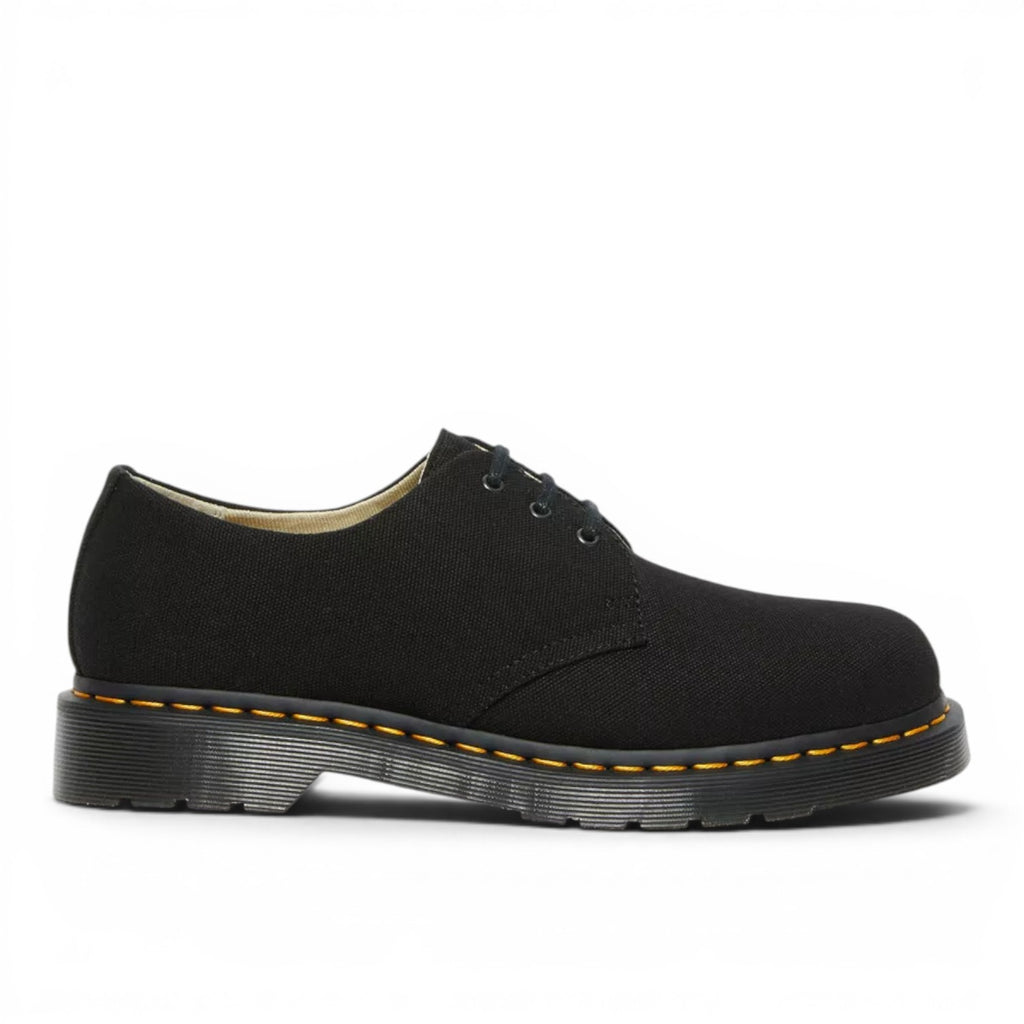 My Store black canvas 1461 Oxford shoes with yellow stitching and PVC sole. Made from 100% organic cotton.