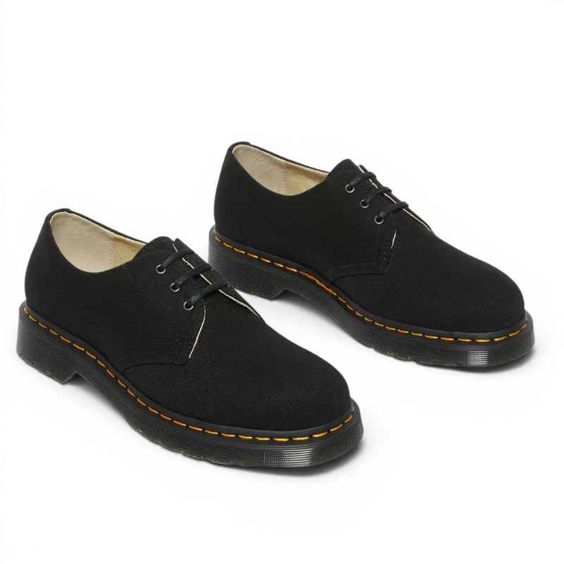 My Store black canvas 1461 Oxford shoes with yellow stitching and black PVC sole.