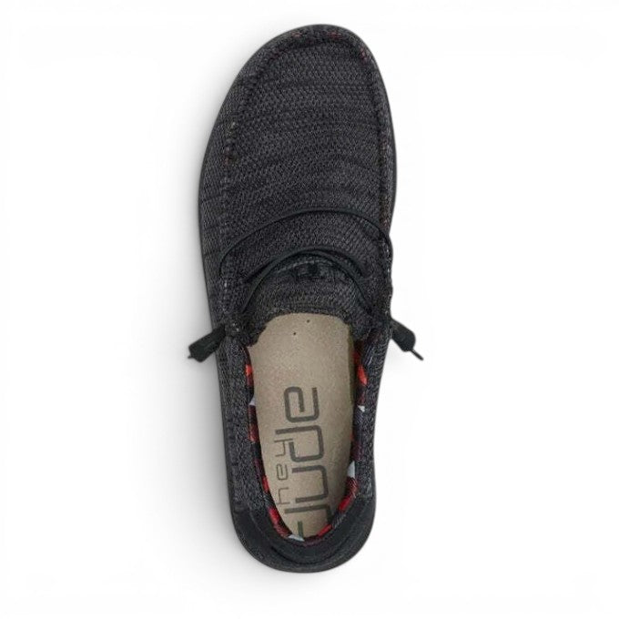 My Store black textile slip-on casual shoes with elastic laces and Hey Dude logo on the insole.
