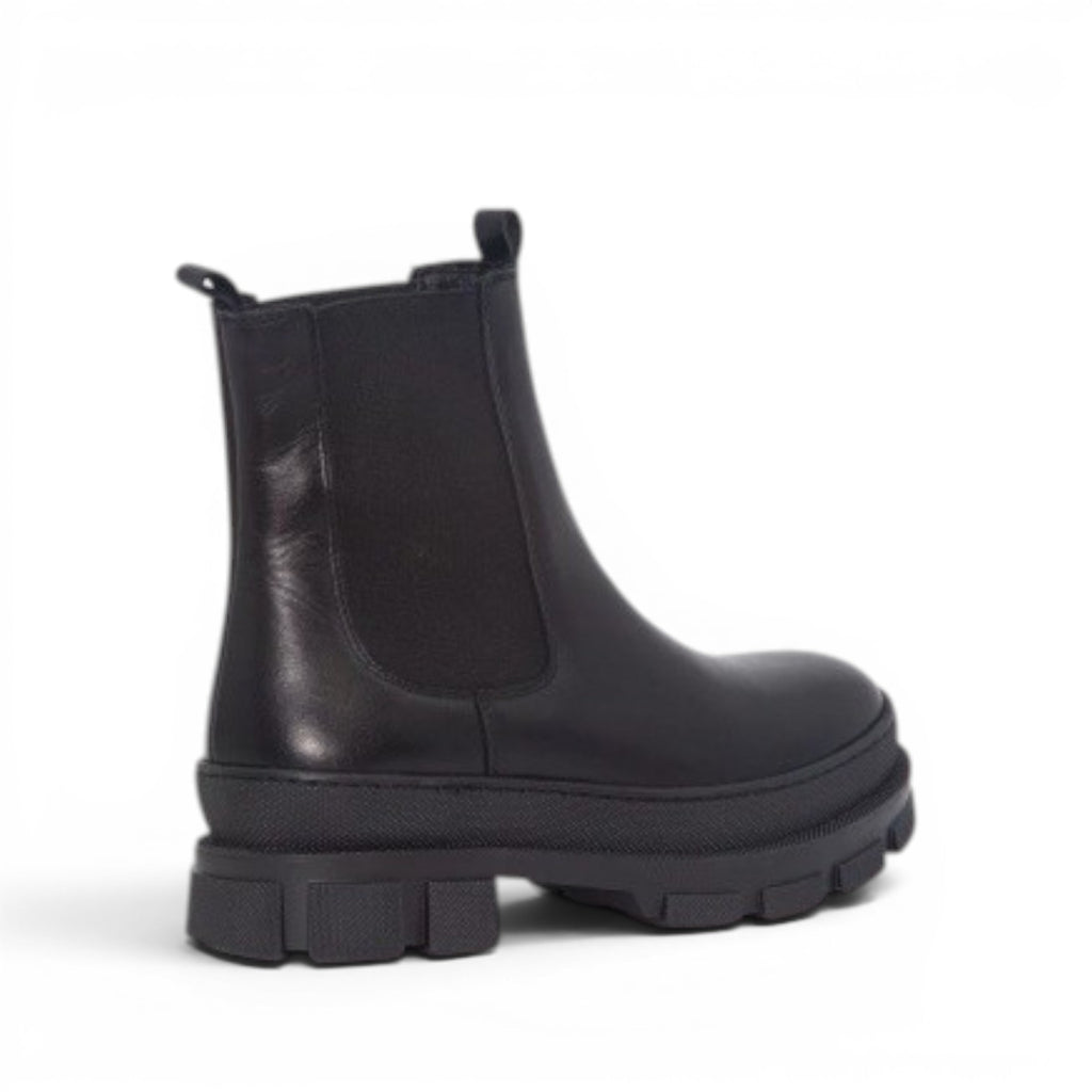 My Store black leather chelsea boots with fleece lining and chunky sole. Side view.