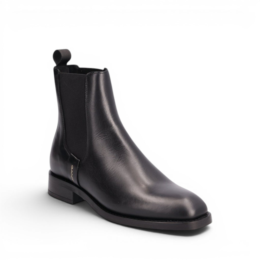 My Store black leather Chelsea boots with elastic side panels and a pull tab. Made in Portugal.