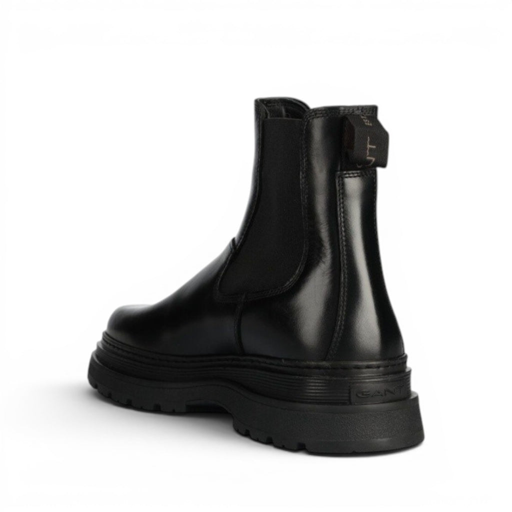 My Store black leather chelsea boots with a thick rubber sole and wool lining.