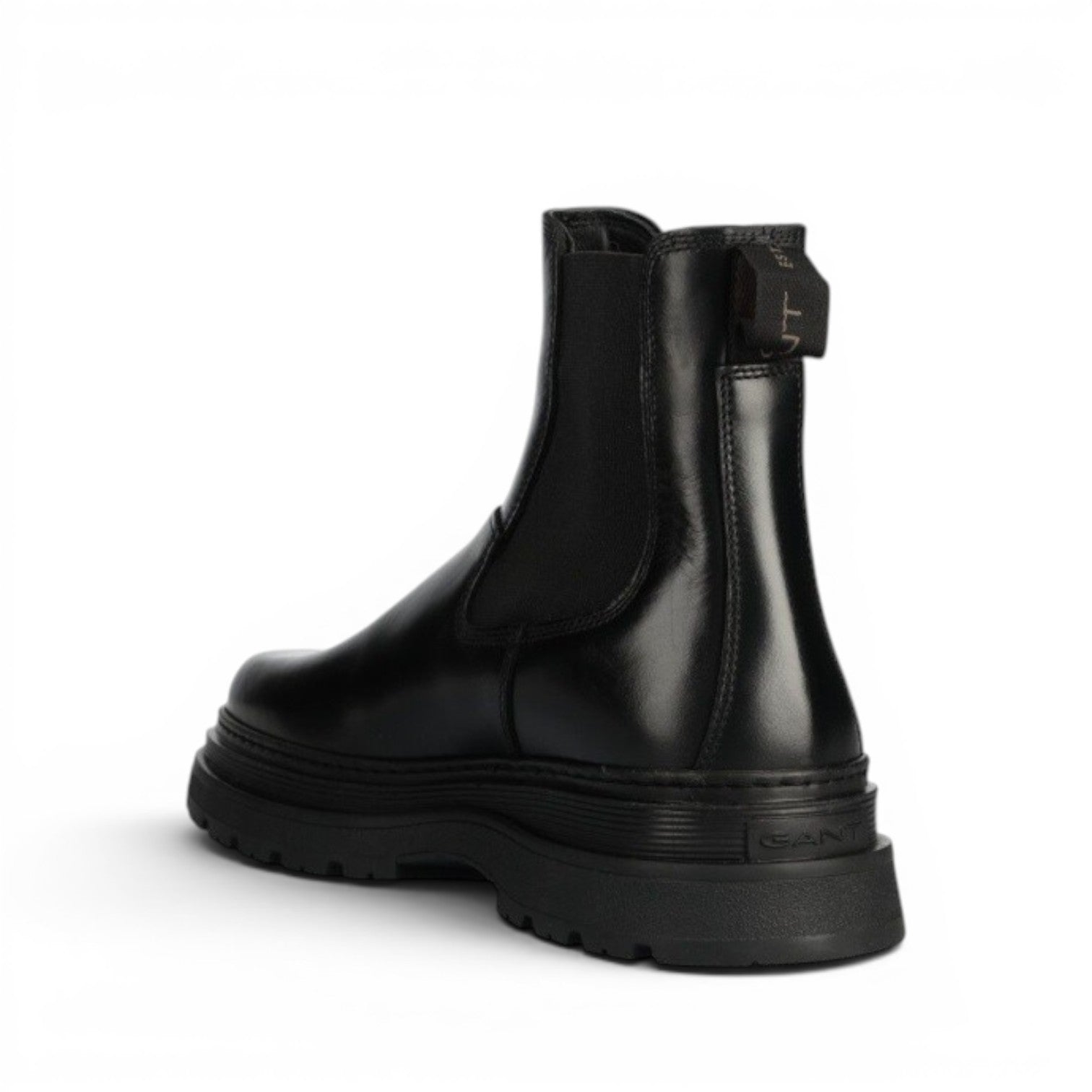 My Store black leather chelsea boots with a thick rubber sole and wool lining.