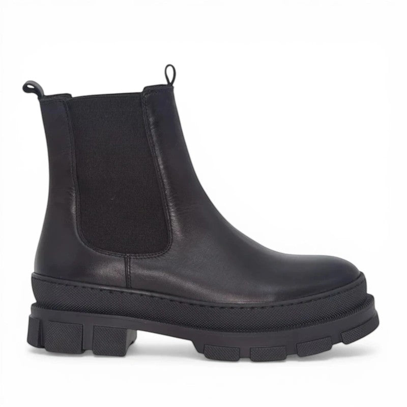My Store black leather chelsea boots with fleece lining and chunky lug sole.
