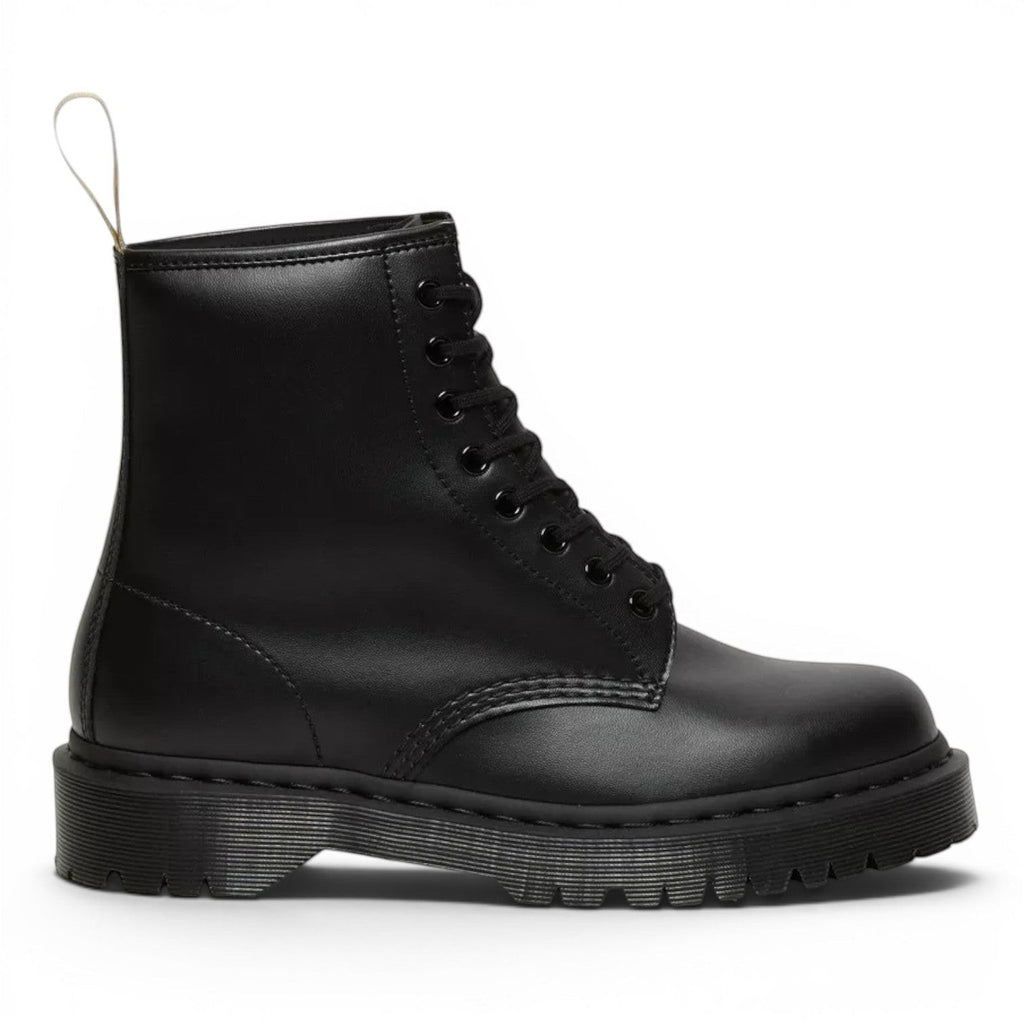 My Store black vegan leather 1460 Bex Mono Dr. Martens boots with a platform sole and yellow heel loop.