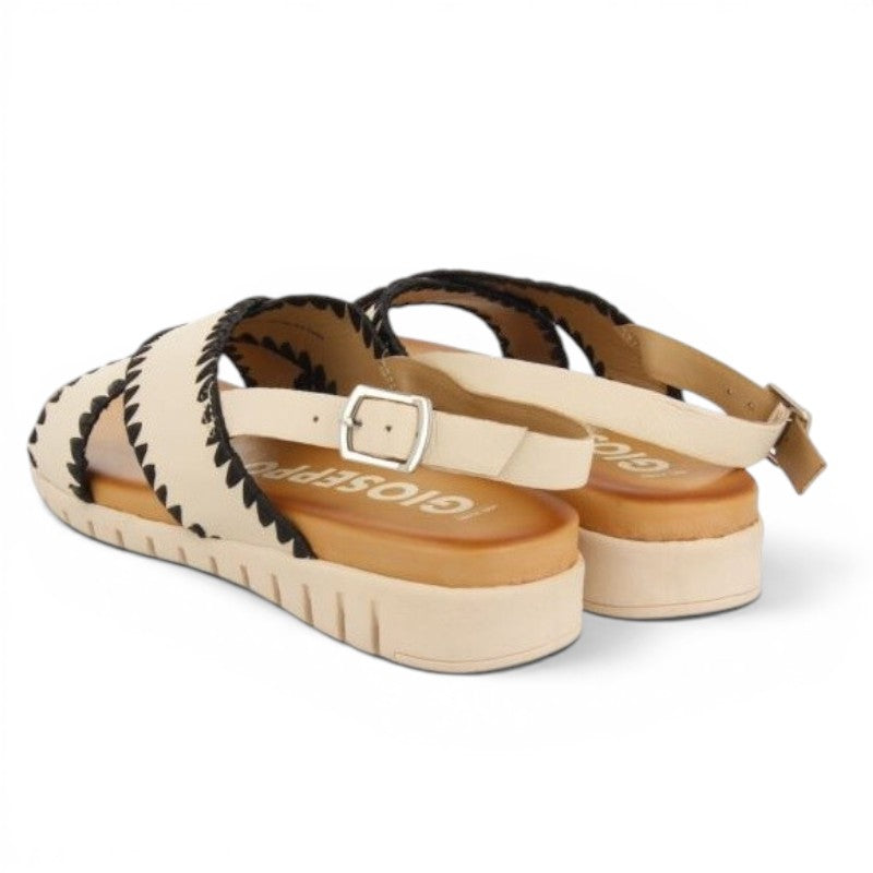 My Store Bohol cream leather sandals with black trim and buckle strap.