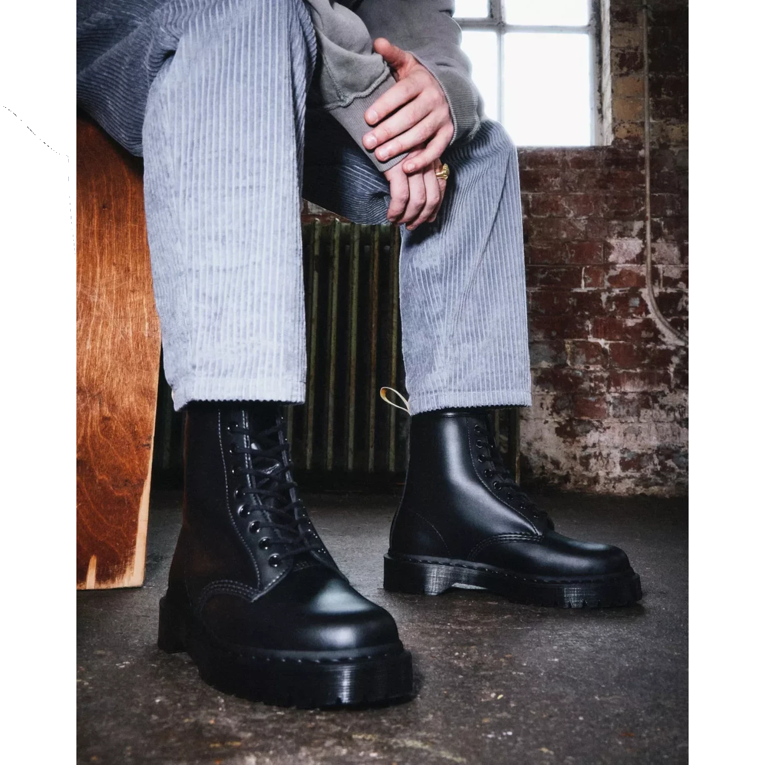 My Store Dr. Martens 1460 Bex Mono Vegan black synthetic leather lace-up boots with platform sole.
