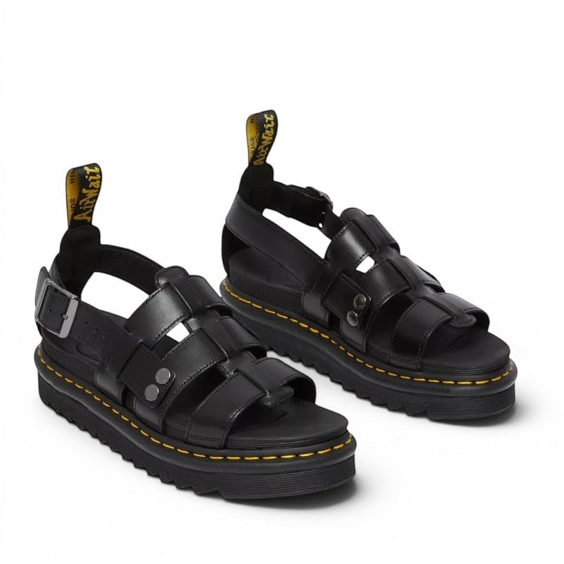My Store Dr. Martens black Brando leather fisherman sandals with adjustable ankle strap and signature yellow stitching.