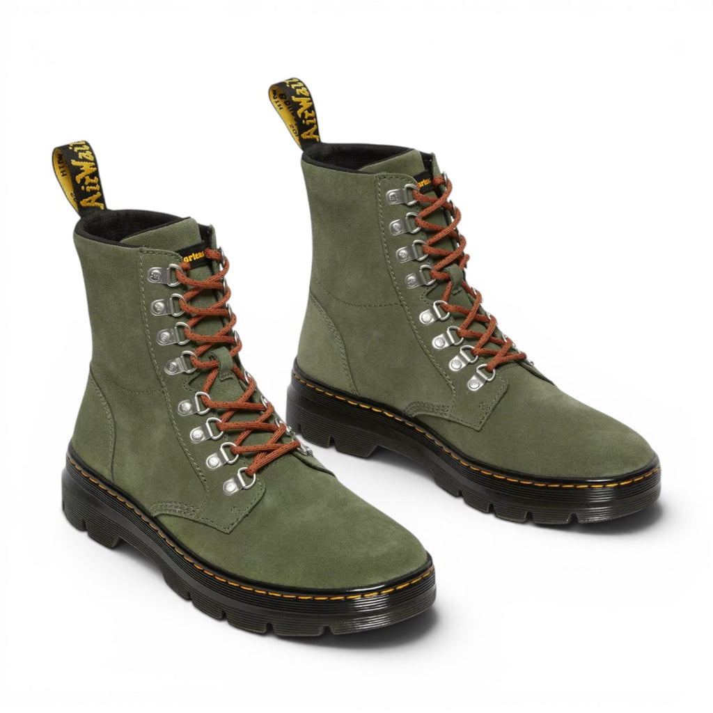 My Store Dr. Martens green suede utility boots with orange laces and silver eyelets.