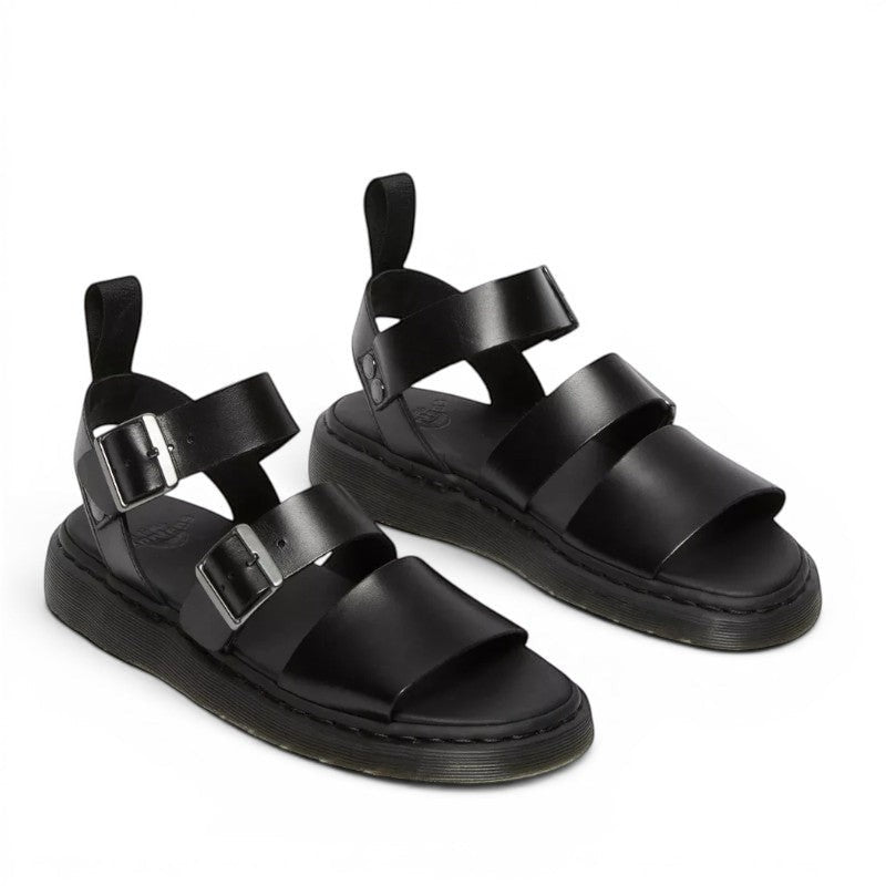 My Store Dr. Martens Gryphon Brando black leather sandals with two adjustable buckle straps and a thick sole.