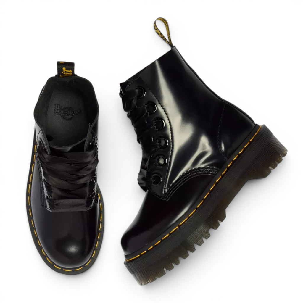 My Store Dr. Martens Molly black leather platform boots with satin laces and yellow stitching.