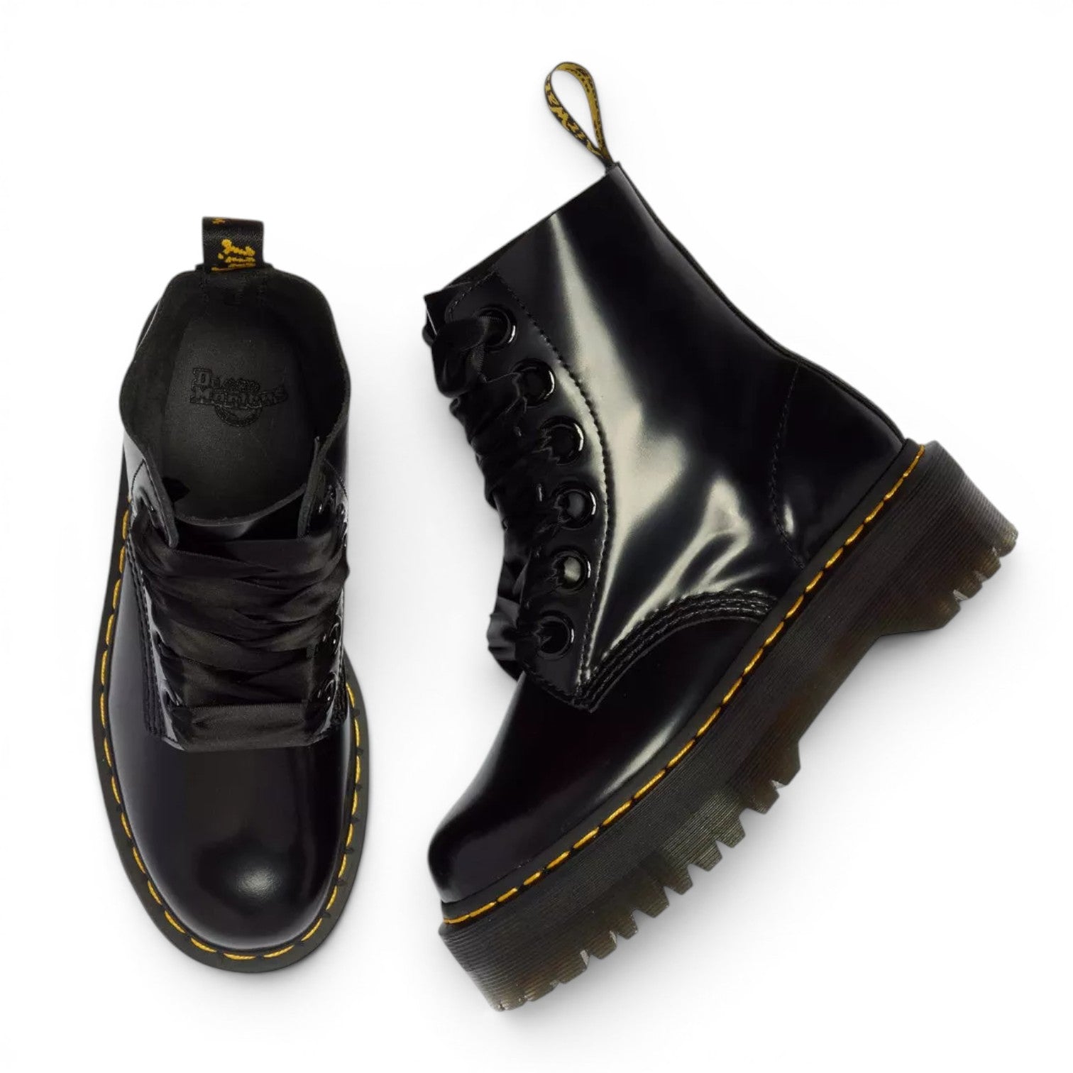 My Store Dr. Martens Molly black leather platform boots with satin laces and yellow stitching.