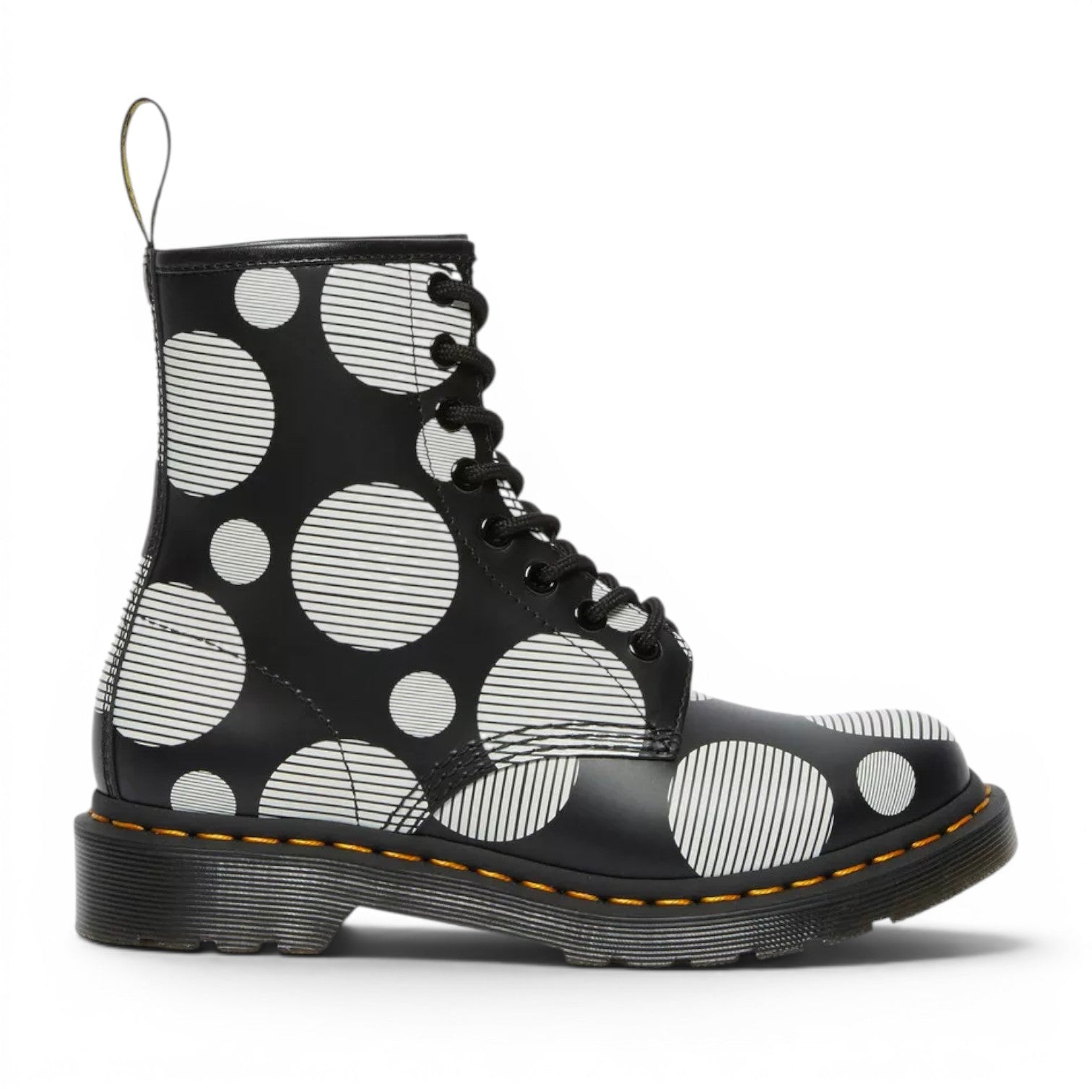 My Store Dr. Martens 1460 black leather boots with white polka dot and stripe pattern. Features yellow stitching and black laces.