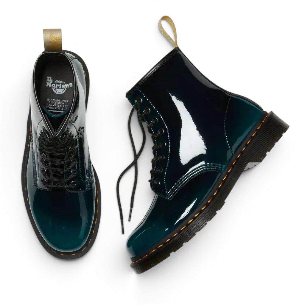 My Store Dr. Martens 1460 Gloss Vegan boots in gradient dark green patent synthetic material with black laces and yellow stitching.