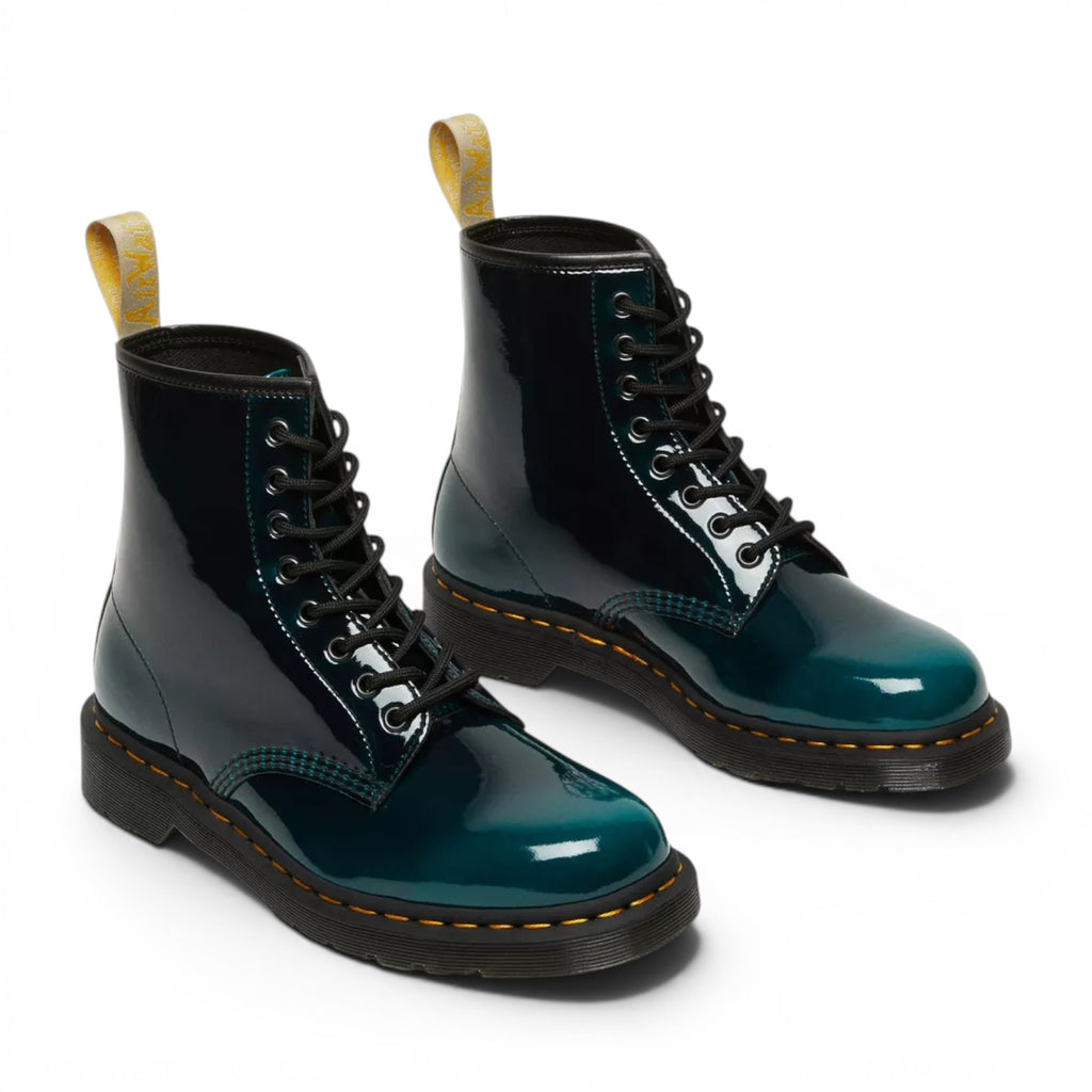 My Store Dr. Martens 1460 Gloss Vegan boots in deep teal patent synthetic material with yellow heel loop and black laces.