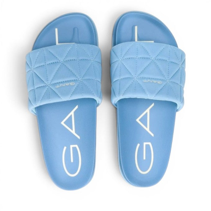 My Store light blue quilted textile slides with rubber sole and GANT logo.