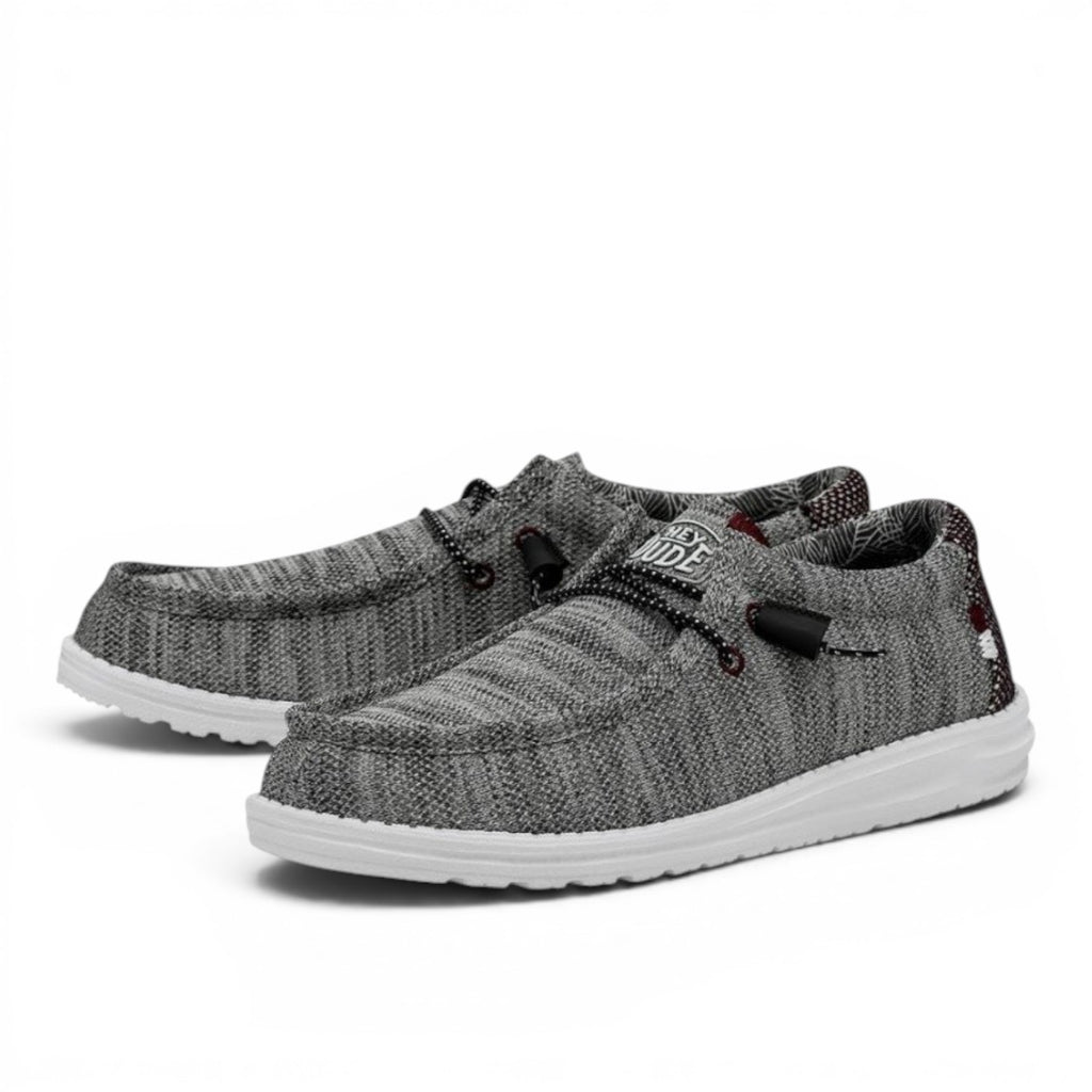 My Store grey knit slip-on shoes with elastic laces and white soles. Features a textured knit upper and a comfortable, casual design.