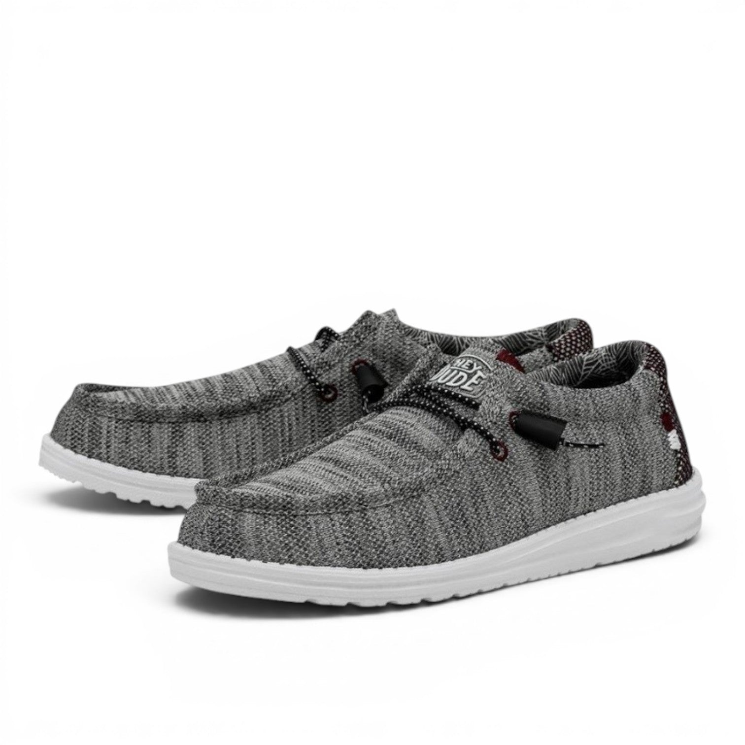 My Store grey knit slip-on shoes with elastic laces and white soles. Features a textured knit upper and a comfortable, casual design.