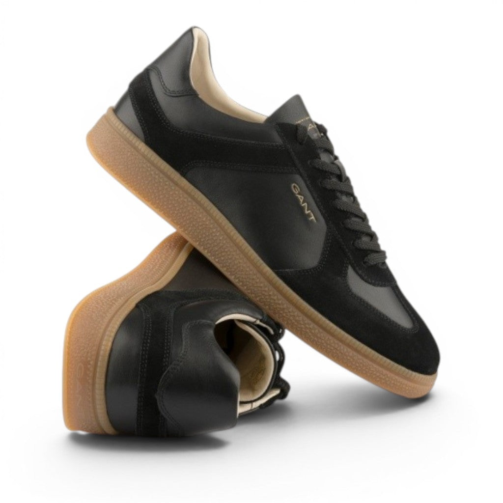 My Store Guzmo black leather sneakers with suede accents and gum sole.