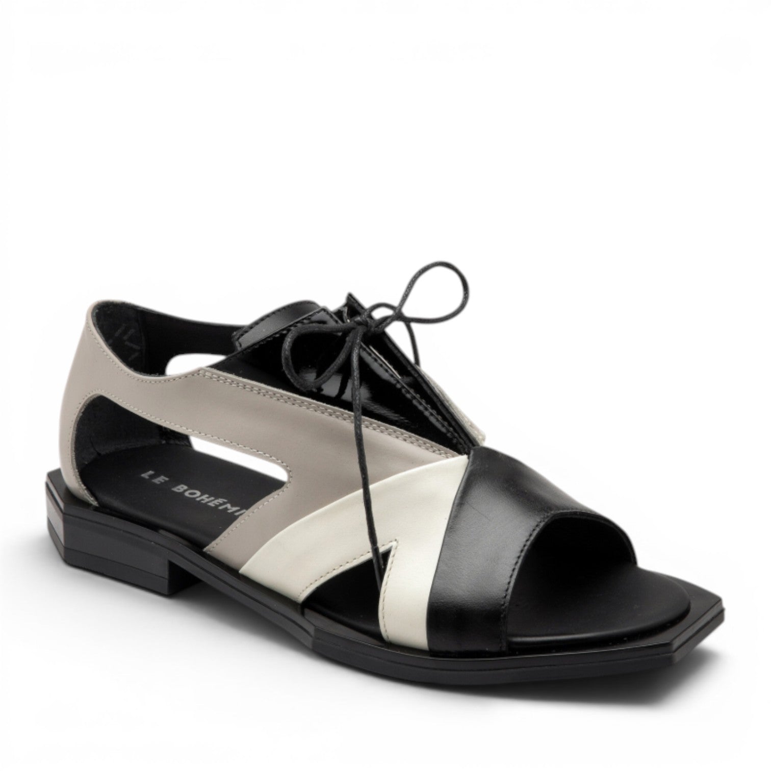 My Store Le Bohemien black, white, and grey leather lace-up sandals with cut-out details.