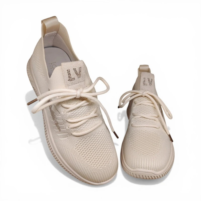 My Store Loretta Vitale beige knit sneakers with leather insole and rubber sole. Features LV logo detail.