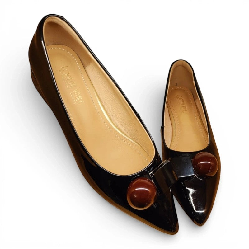 My Store Loretta Vitale black patent leather pointed toe flats with decorative ball and bow detail.