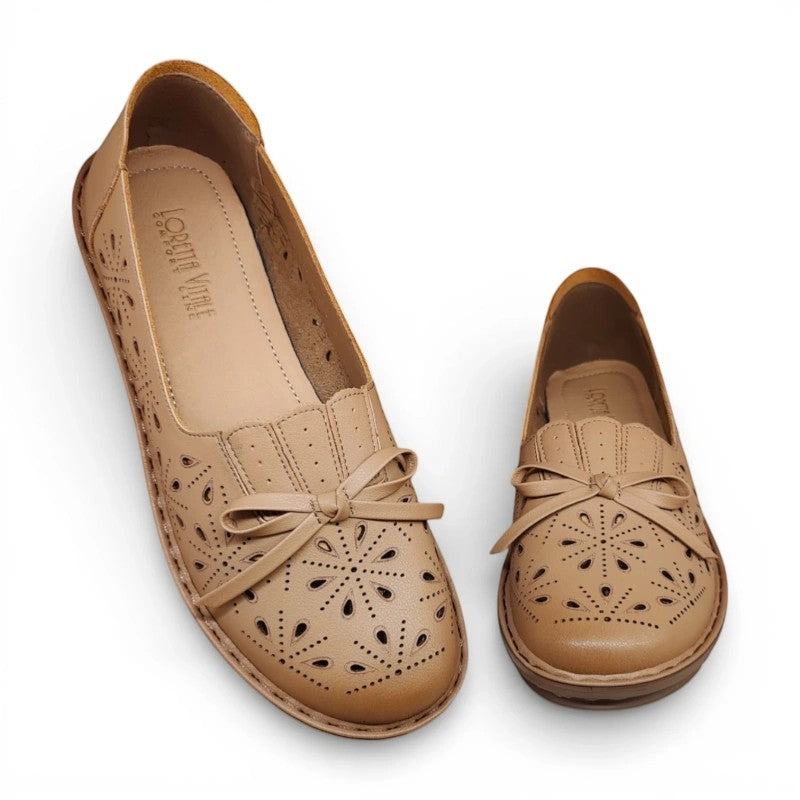 My Store Loretta Vitale W9913 beige leather ballet flats with cut-out floral design and bow detail.