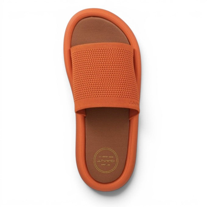 My Store orange textile slide sandals with a textured knit strap and brown footbed.