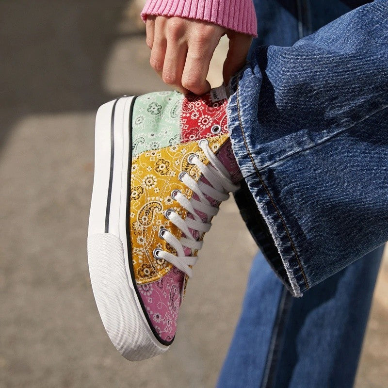My Store One Way Patchwork high-top sneakers in pink, yellow, red, and mint green paisley print textile. White laces and platform sole.