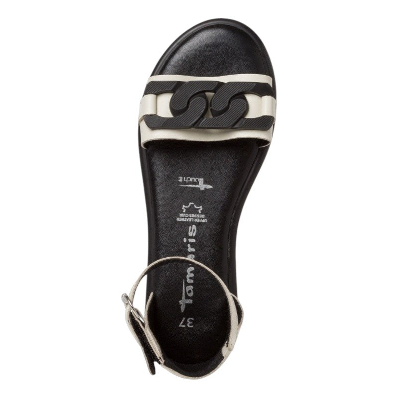 My Store Tamaris black and white leather flat sandals with decorative chain detail and ankle strap.