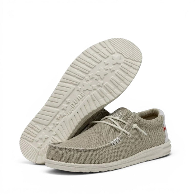 My Store Wally Braided men's tan textile slip-on shoes with white laces and soles. Features elastic laces and a removable insole.