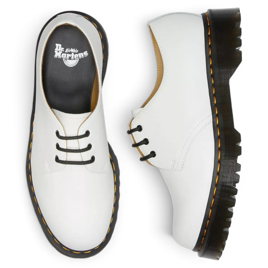 My Store white smooth leather Dr. Martens 1461 Bex Oxford shoes with black laces and signature yellow stitching on a black PVC sole.