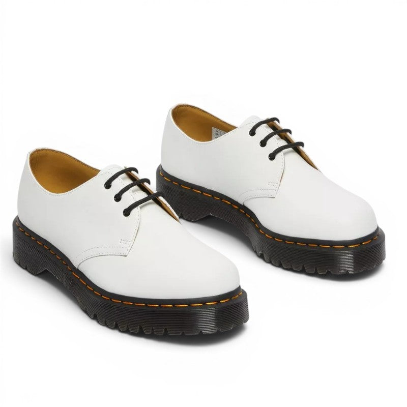 My Store white smooth leather Dr. Martens 1461 Bex platform oxford shoes with black laces and yellow stitching.