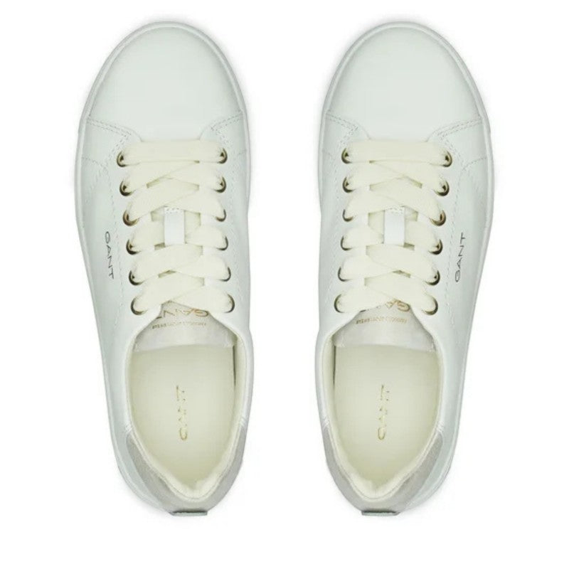 My Store white leather low-top sneakers with cream laces and subtle grey heel detail.
