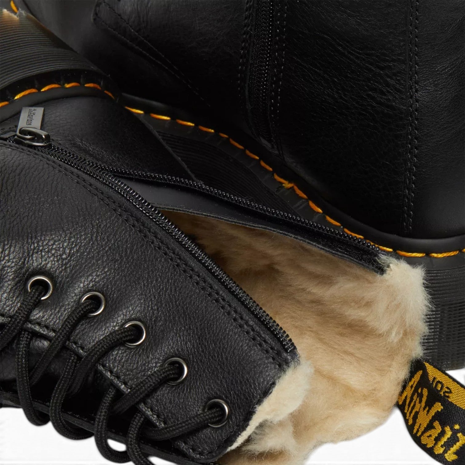 My Store black leather Jadon boots with faux fur lining and yellow stitching detail.