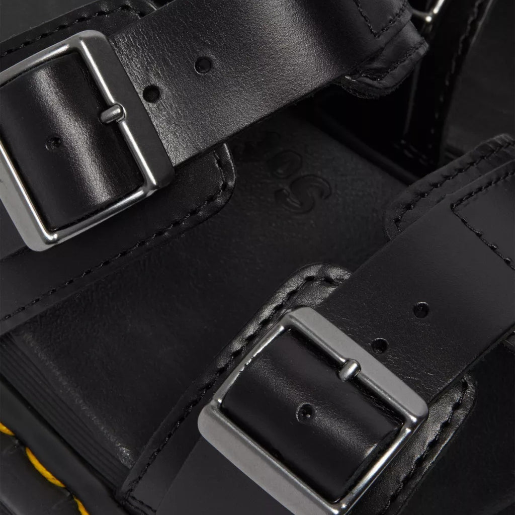 My Store black Brando leather sandals with adjustable buckles and signature yellow stitching.