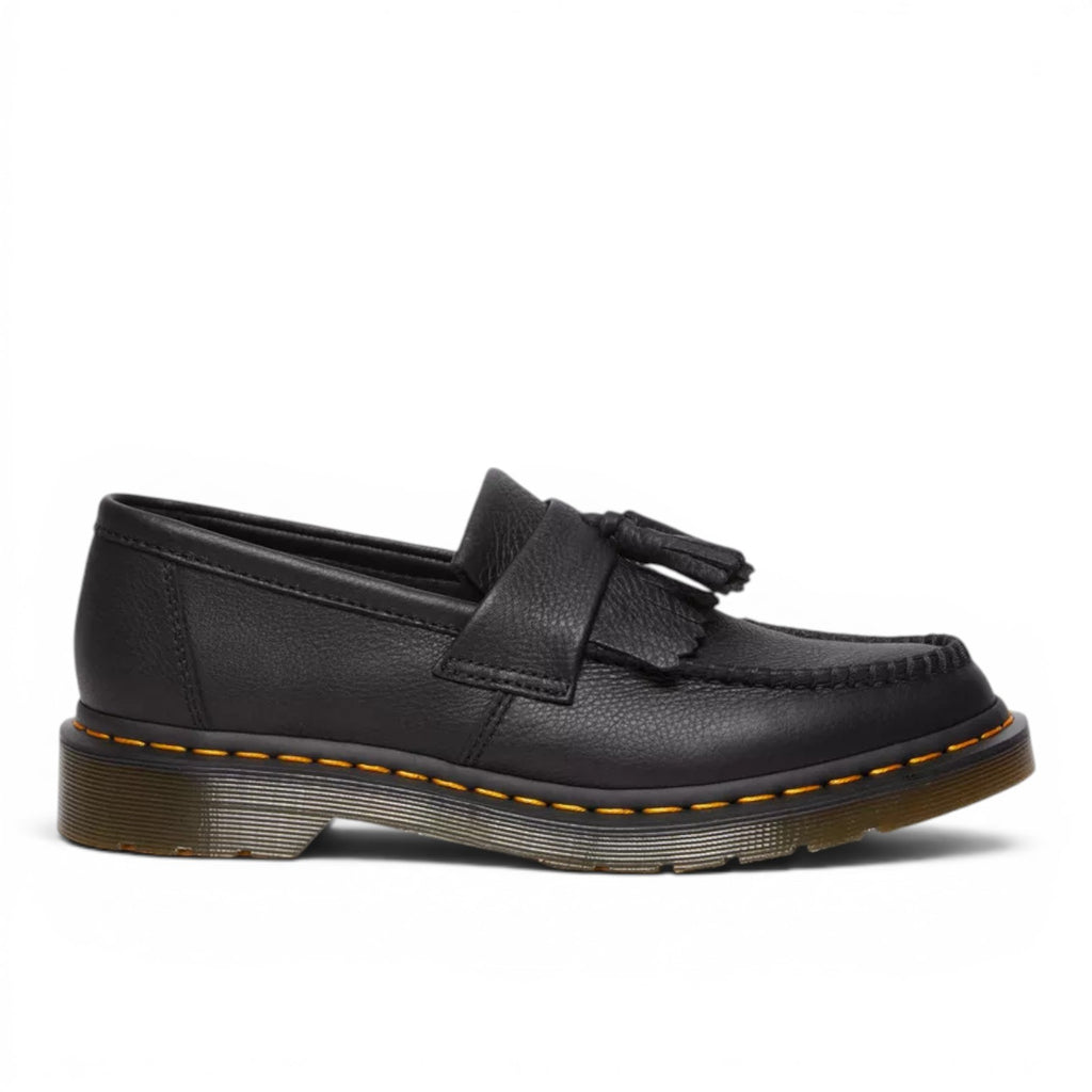 My Store black pebbled leather Dr. Martens Adrian tassel loafers with Goodyear welt construction.