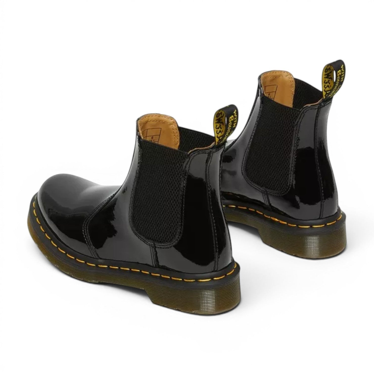 My Store Dr. Martens 2976 black patent leather Chelsea boots with yellow stitching and elastic side panels.