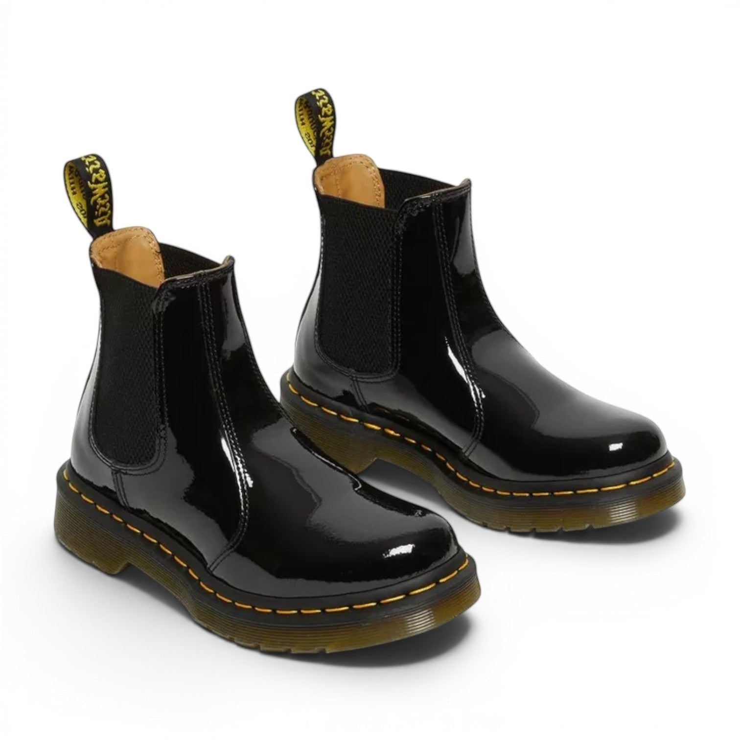 My Store black patent leather Chelsea boots with elastic side panels and yellow stitching.