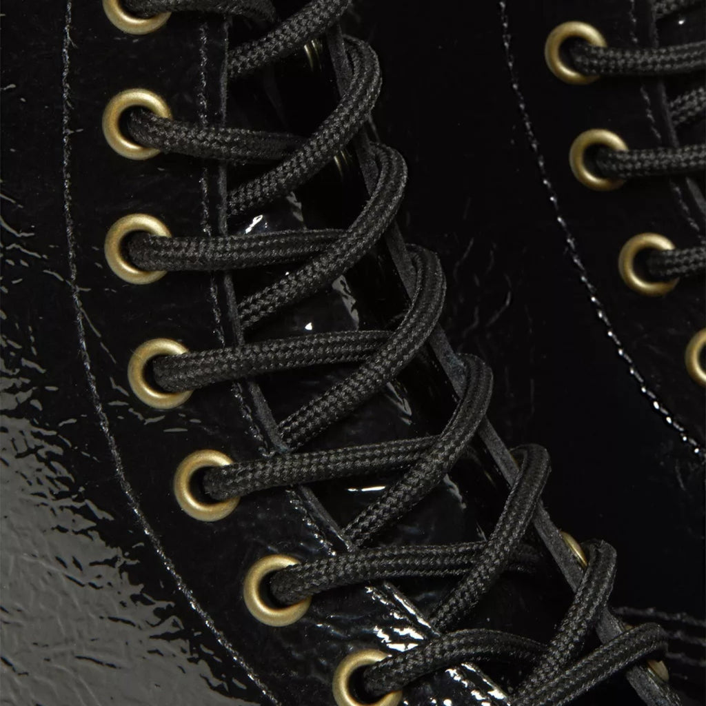 My Store Dr. Martens 1460 Distressed Patent black patent leather lace-up boots with gold eyelets.
