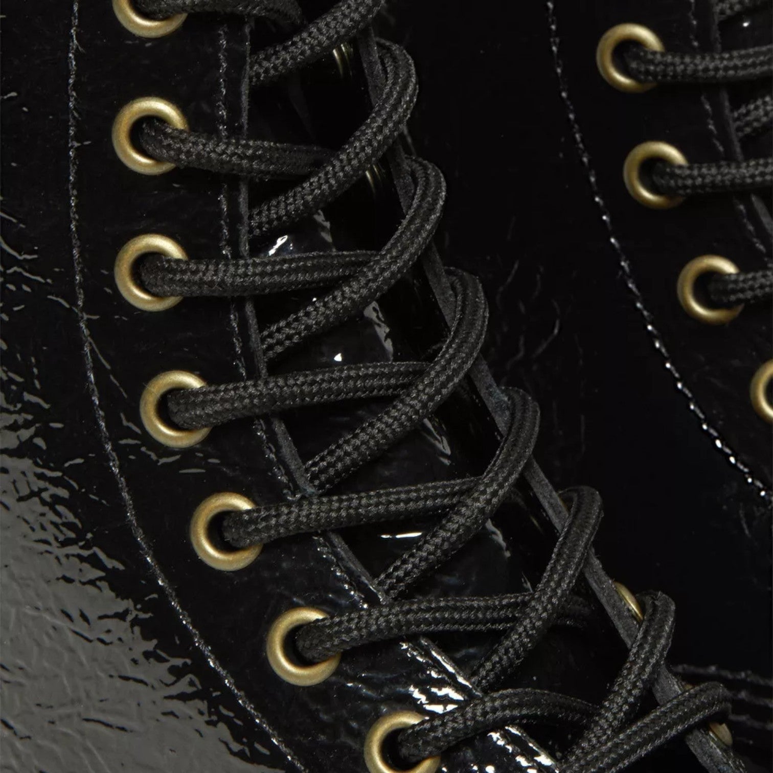 My Store Dr. Martens 1460 Distressed Patent black patent leather lace-up boots with gold eyelets.
